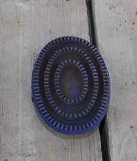 Rubber curry comb, great for getting rid of dirt and loose horsehair.